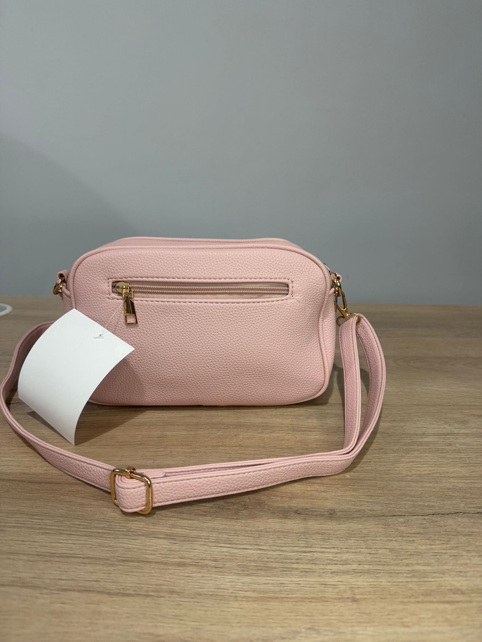 Bolso v-Bolso Bandolera "V-Icon" Rosa Pastel – Elegancia Compacta